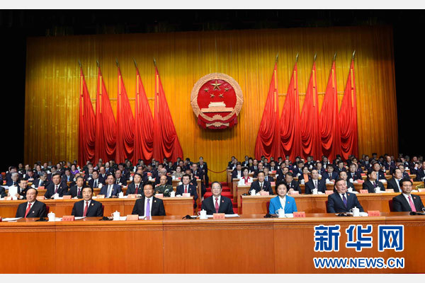 10月1日，慶祝中華人民共和國成立66周年暨新疆維吾爾自治區成立60周年大會在新疆人民會堂隆重舉行。 新華社記者 饒愛民 攝