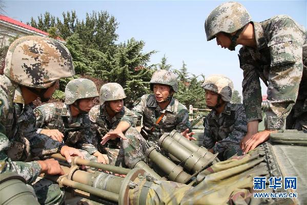 (十九大代表風采·圖文互動)(2)“大功三連”指導員王金龍:矢志強軍的“播火者”