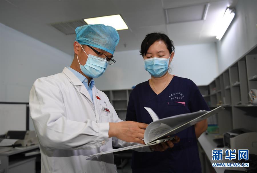 (一線抗疫群英譜·圖文互動)(8)張正良:“我們完成了自己的使命”