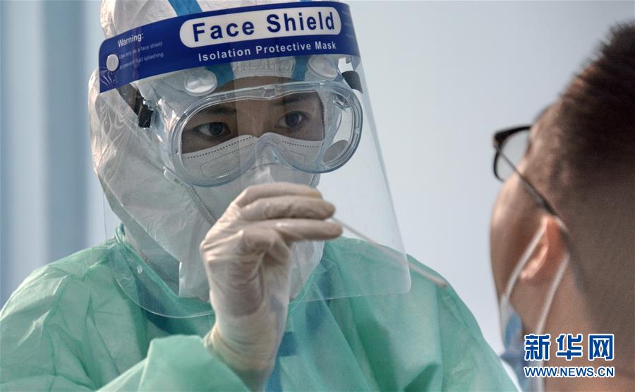 (新華全媒頭條·圖文互動)(11)構筑守護城市、守護生命的堅強防線——北京開展大規模核酸檢測