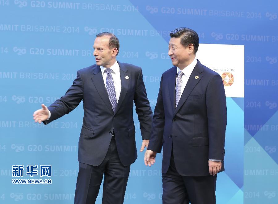 11月15日,二十國集團領導人第九次峰會在澳大利亞布里斯班舉行。國家主席習近平出席會議并發表題為《推動創新發展實現聯動增長》的重要講話。這是澳大利亞總理阿博特迎接習近平主席。 新華社記者 丁林 攝 11月15日,二十國集團領導人第九次峰會在澳大利亞布里斯班舉行。國家主席習近平出席會議并發表題為《推動創新發展實現聯動增長》的重要講話。這是澳大利亞總理阿博特迎接習近平主席。 新華社記者 丁林 攝