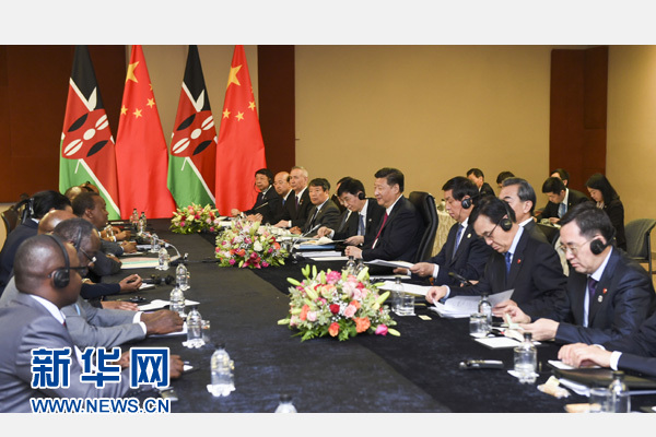 12月3日,國家主席習近平在約翰內斯堡會見肯尼亞總統肯雅塔。新華社記者 謝環馳 攝 12月3日,國家主席習近平在約翰內斯堡會見肯尼亞總統肯雅塔。新華社記者 謝環馳 攝