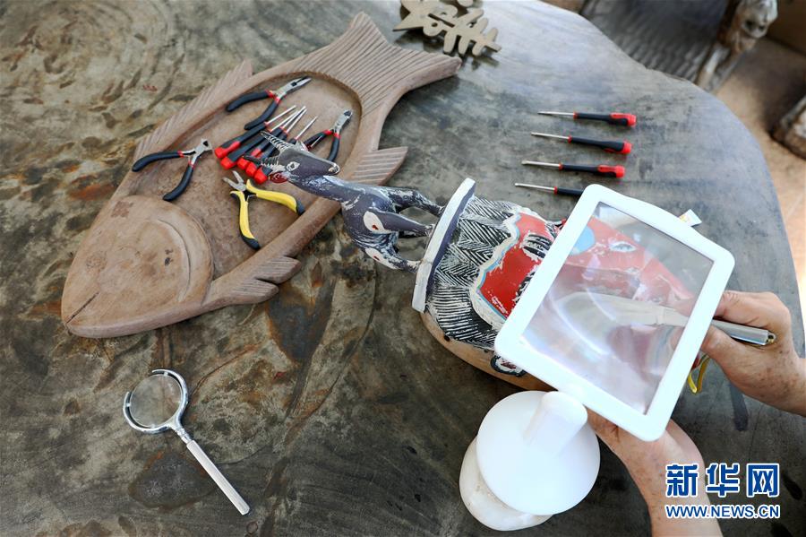 （國際&middot;圖文互動(dòng)）（6）通訊：收藏&ldquo;非洲之美&rdquo;的中國人&mdash;&mdash;訪幾內(nèi)亞灣非洲國際藝術(shù)博物館館長謝燕申