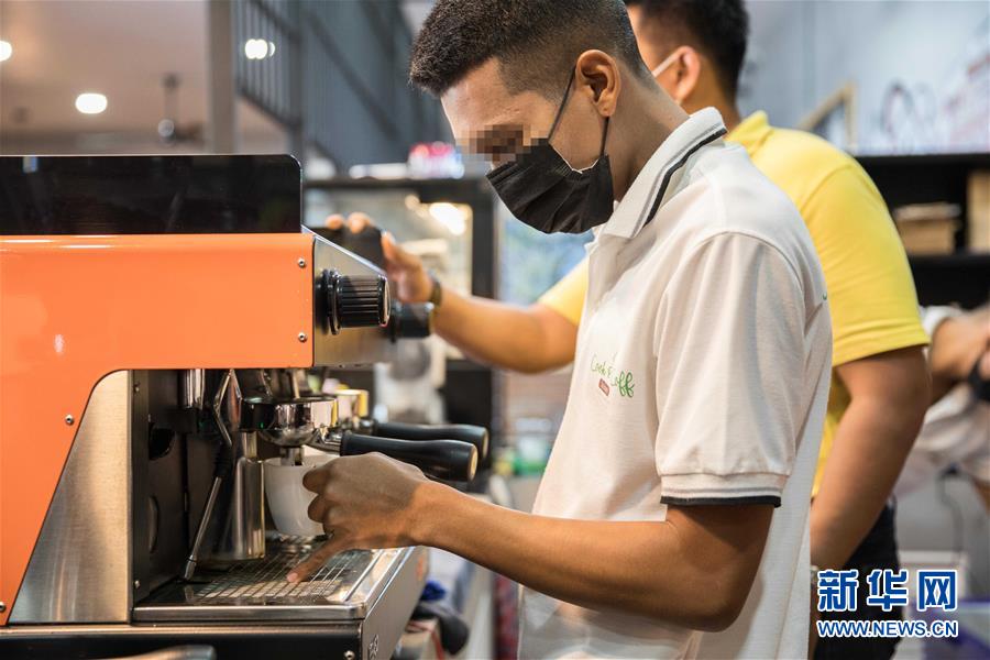 (國際·圖文互動)(5)走進泰國社區(qū)的“監(jiān)獄咖啡館”